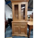 Light Oak Cabinet with glass front and cupboard and drawers under