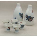 7 Chinese tea cups and vases