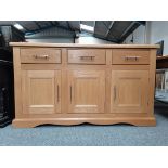 Light Oak sideboard with 3 cupboards and drawers