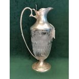 A LATE VICTORIAN SILVER-MOUNTED CLARET JUG