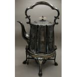 A SILVER-PLATE SPIRIT KETTLE ON STAND