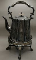 A SILVER-PLATE SPIRIT KETTLE ON STAND