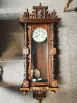A large Vienna wall clock in walnut and in excelle