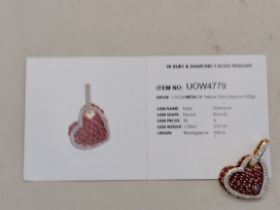 A 9 carat gold ruby and diamond pendant