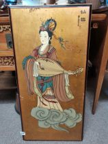 A Chinese wall plaque depicting a gentrified woman
