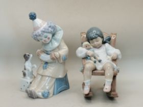 x2 Lladro figurines, Clown with dog and Girl with doll