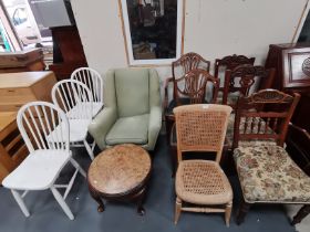 A collection of x10 chairs and low round side table