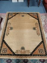 A cream and gold rug 2.3m long