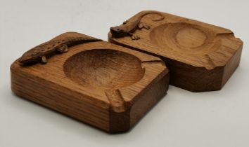 Two Lizardman oak ashtrays