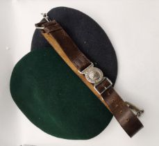 A vintage Cubs belt and buckle, and two berets