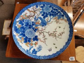 A large Chinese charger with bird and tree decoration
