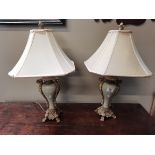 A pair of French Style Ceramic and wood gilt table lamps