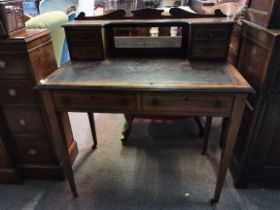 An Edwardian lady's inlaid mahogany writing desk
