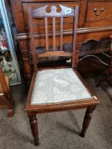 A mahogany bedroom chair with newly covered rabbit