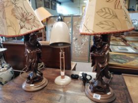 A pair of Chinese carved rootwood figural table lamps, and an anglepoise lamp