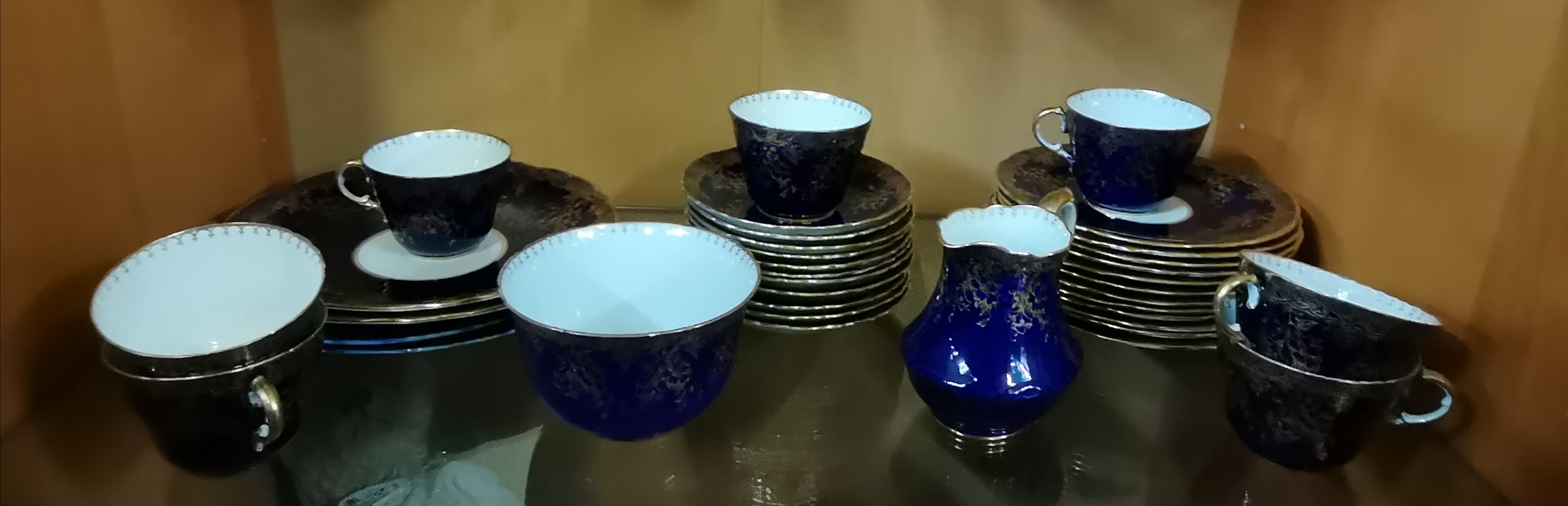 Aynsley China part Tea Set in blue with gold gilt decoration