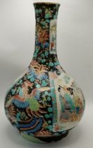 A Chinese 32cm baluster vase decorated with peacoc