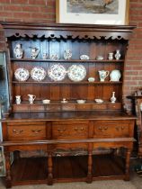 An oak dresser and rack, 20th Century