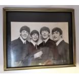 Signed photo of the Beatles