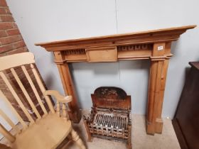 Pine fire surround and cast iron fire basket with back
