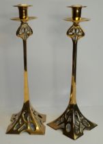 A pair of Art Nouveau brass candlesticks