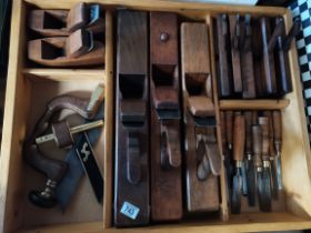 Large box of wood working planes and tools