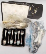 A small quantity of silver and silver-plated flatware
