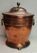 An Art Nouveau copper and brass coal bucket