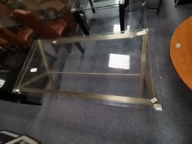 A glass dining table with x framed folding frame 1
