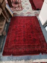 A silk red rug 1.9m x 1.5m