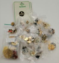 A large selection of enamelled collectors pin badges