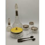 A small group of silver plate and silver-mounted dressing table jars