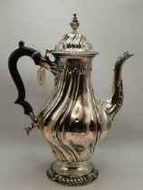 An Edwardian silver coffee pot