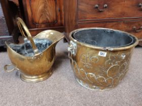 An Antique brass large coal bucket with historic c