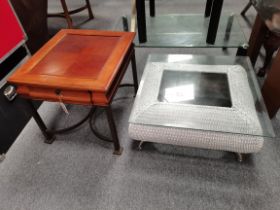 A rattan table and mahogany side table