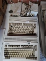 AMIGA Commodore A600 computers and drives