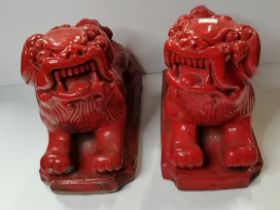 A pair of Chinese Fu dog models, 20th Century