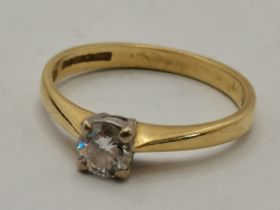 A diamond solitaire ring on 18k gold 2g size L