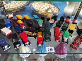 A Shelf of Cars by Corgi, Lledo etc