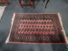 A pink and blue rug 1.6m x 90cm
