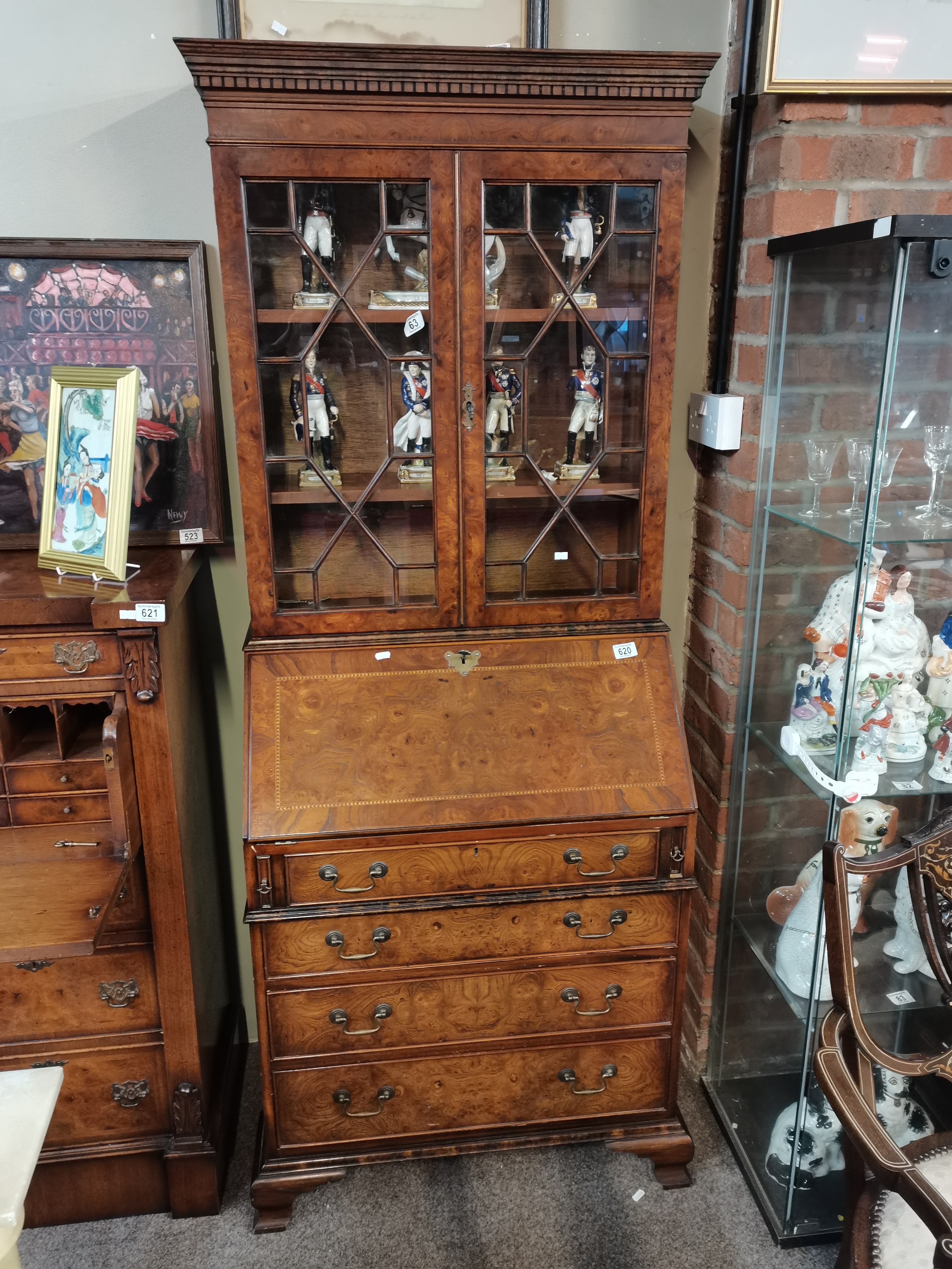 Birds eye walnut glass topped display cabinet