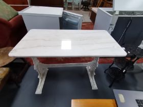 x3 cast iron base tables, one with marble top