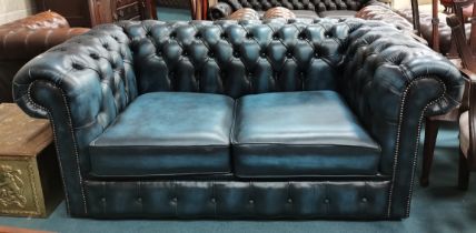 Antique Blue Chesterfield 2 seater sofa bed.