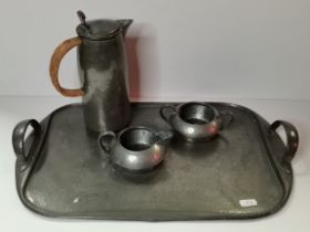 A three-piece Tudric pewter tea service and tray, early 20th Century