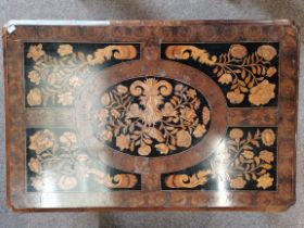 A marquetry inlaid centre table