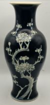 A blue and white prunus Chinese vase with 4 charac