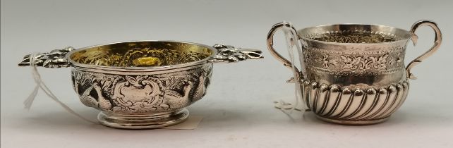 A William IV Scottish silver quaich and a miniature William and Mary style twin-handled silver cup