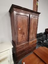 An Antique mahogany linen press with 2 drawers and