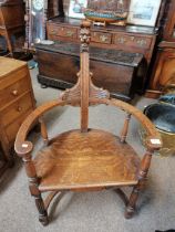 An unusual caquetoire-style oak chair, late 19th/early 20th Century