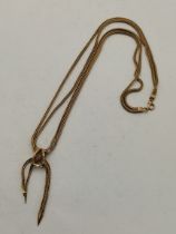 A 9ct gold double strand snake chain necklace
